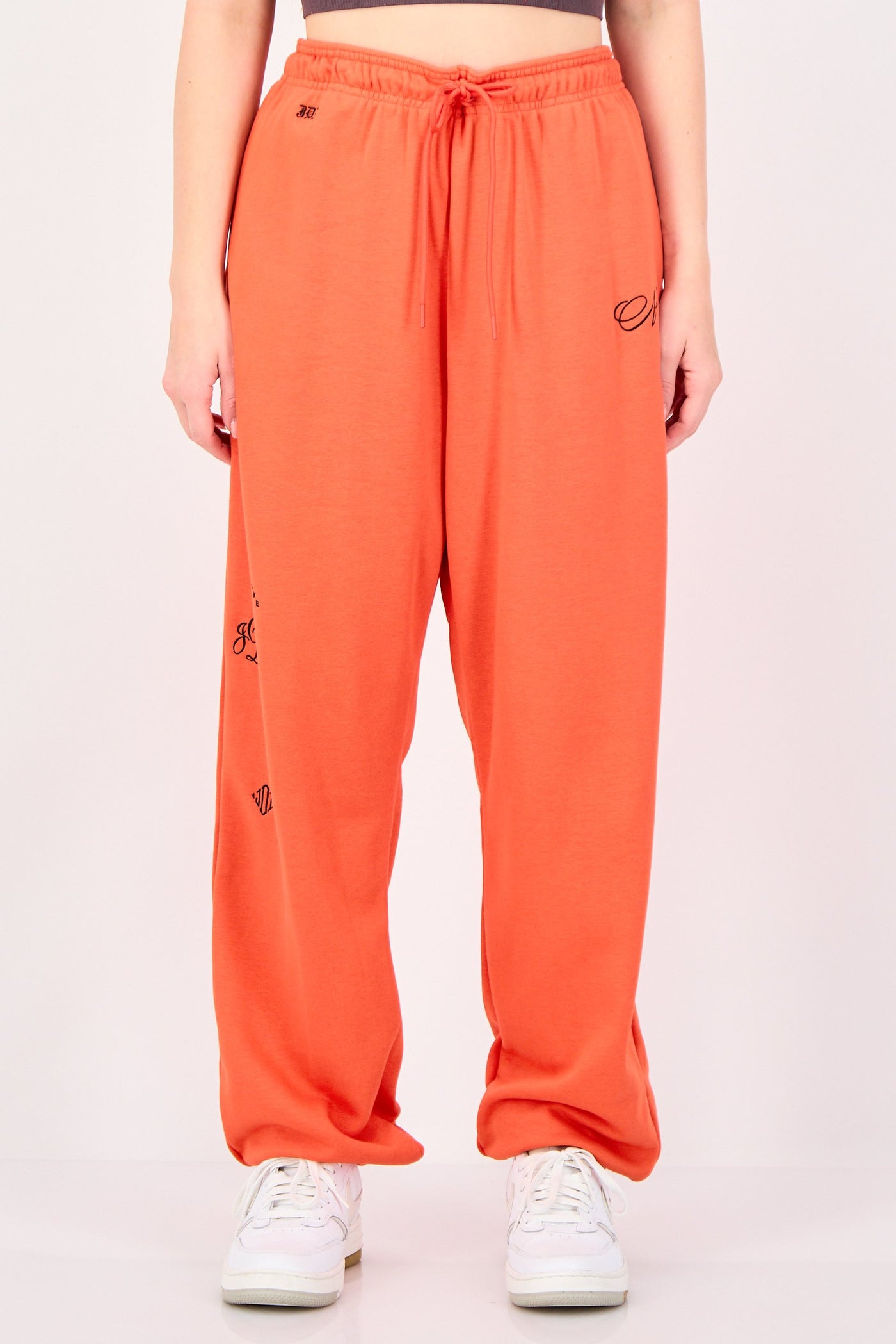orange nike sweatpants womens