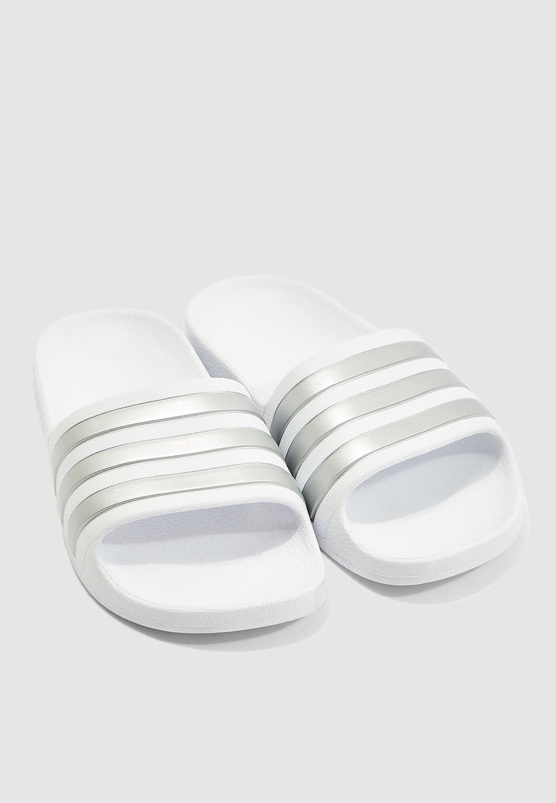 Adilette Aqua Slides White - pnsku/N30262312V/45/_/1734589956/e0764e35-3787-4bff-a43b-96a344ceddb8