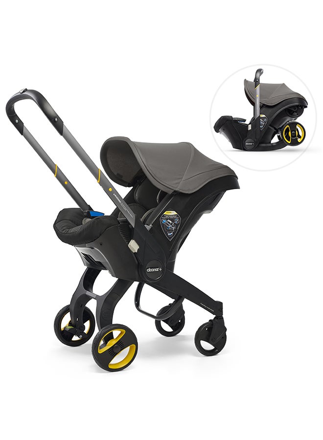 Doona Baby Car Seat And Travel Stroller - Urban Grey, Convertible 0+ Car Seat And Pram With 5 Point Safety Harness Ergonomic Pushchair And Travel System Isofix Base Sold Separately  - Image 1