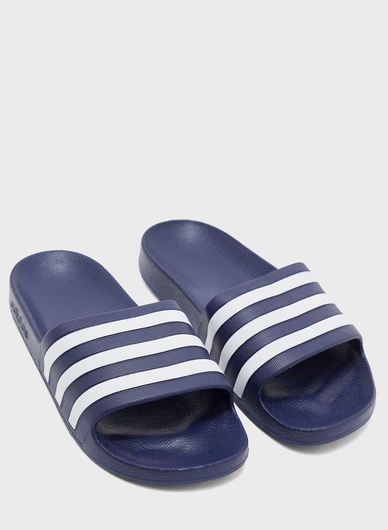 Adilette Aqua Slides Navy/White - pnsku/N37689297V/45/_/1734590004/ad801574-c24b-48af-9588-526b9517d42a