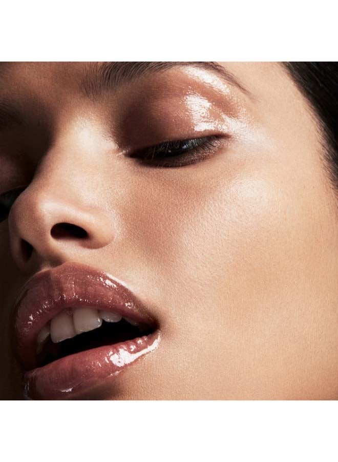 FENTY BEAUTY Gloss Bomb Universal Lip Luminizer Fenty Glow - Shimmering Rose Nude - Image 4