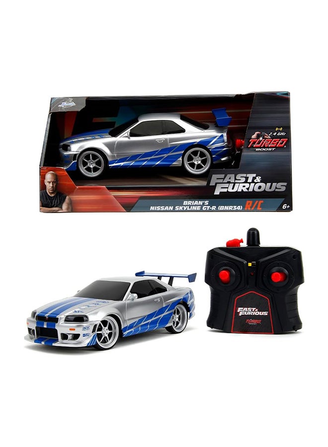 JADA Toys Fast & Furious 2002 Nissan GT-R R34 Remote Control Car RC with 2.4GHz, Toys for Kids and Adults (99371, 1:24, Silver) - Image 1