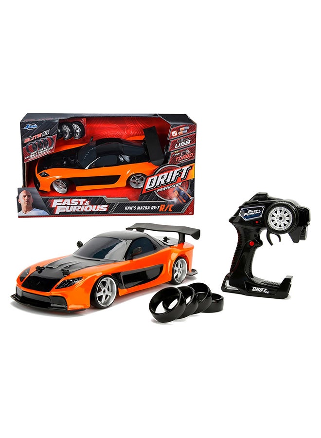 JADA 6-Piece Fast And Furious Remote Control Drift Mazda Car Kit with Opening Doors, Freewheel Vehicle, 1:10 Scale, Orange/Black - Image 1