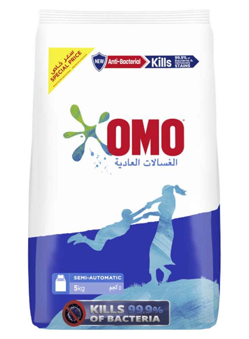 أومو مسحوق منظف غسيل للغسالات العادية 5كيلوجرام - Image 1