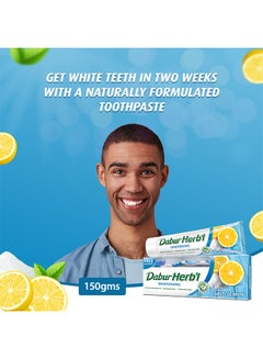 Dabur Herbal Whitening Toothpaste, 150g + Toothbrush Free Pack of 3 150grams  - Image 2