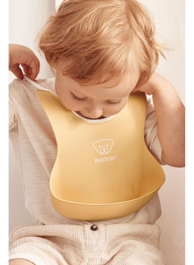 BABYBJORN - Baby Feeding Bib, Powder Yellow - Image 1