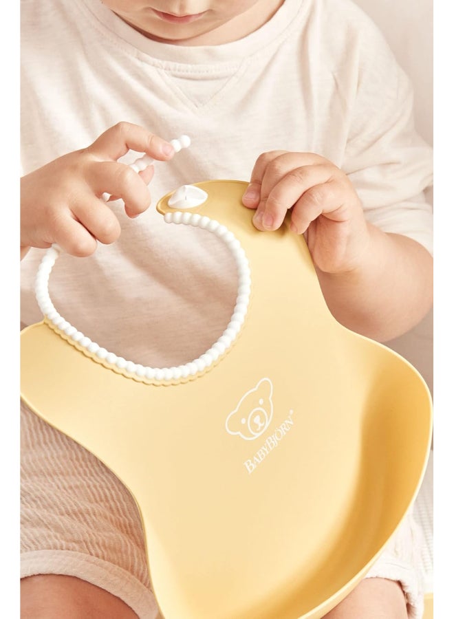 BABYBJORN - Baby Feeding Bib, Powder Yellow - Image 1