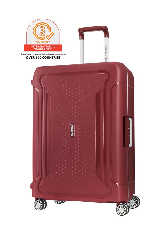 American Tourister Tribus Suitcase, Check-In Size 69 cm / 25 inch, 4 Spinner Wheels, Hard Top, Polypropylene, Red|Address Tag|Dual Tube Pull Handle|Scratch Resistant Texture|XtraSecu™ 3-Point Locking System - 3 Years Global Warranty Red - Image 1