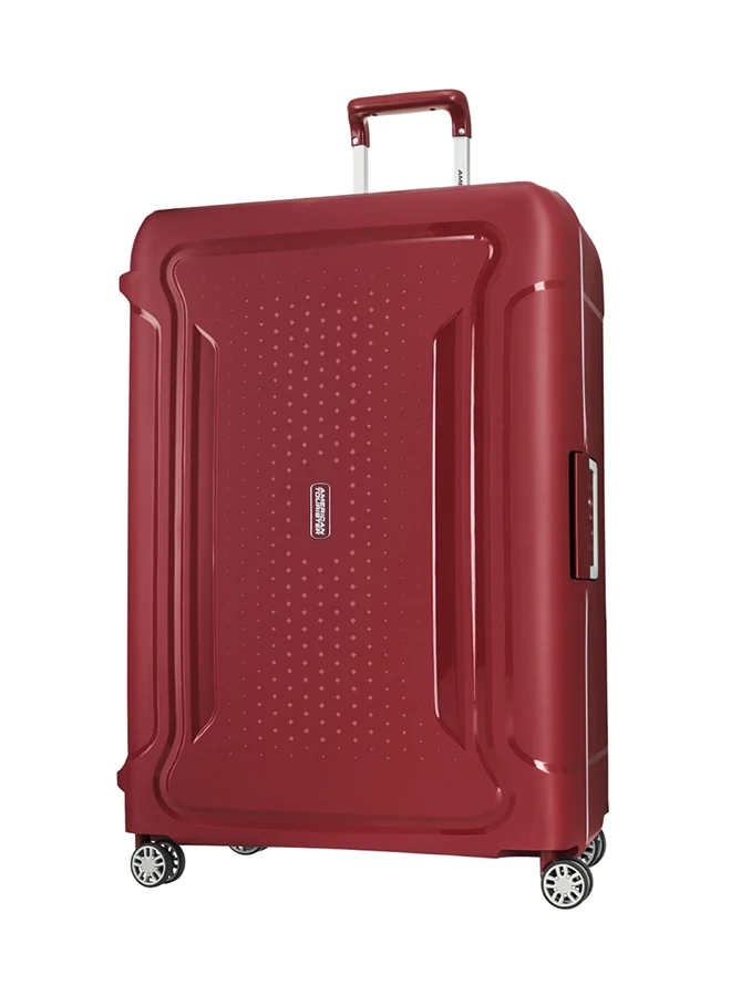 AMERICAN TOURISTER 78 cm / 29 inch Tribus Suitcase, Check-In Size 78 cm / 29 inch, 4 Spinner Wheels, Hard Top, Polypropylene, Red|Address Tag|TSA Lock|Dual Tube Pull Handle|Scratch Resistant Texture|XtraSecu™ 3-Point Locking System - 3 Years International Warranty Red  | Best Price UAE