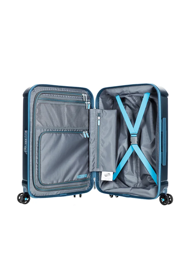 AMERICAN TOURISTER Technum Suitcase, Cabin Size 55 cm / 20 inch, 4 Spinner Wheels, Hard Top, Polycarbonate, Metallic Blue|DuoSaf™ Security Zipper|Dual Tube Pull Handle|Expandable|TSA Lock - 3 Years International Warranty Metallic Blue