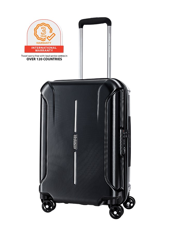 American Tourister Technum Suitcase, Check-In Size 68 cm / 25 inch, 4 Spinner Wheels, Hard Top, Polycarbonate, Diamond Black|DuoSaf™ Security Zipper|Dual Tube Pull Handle|Expandable - 3 Years Global Warranty Diamond Black - Image 1