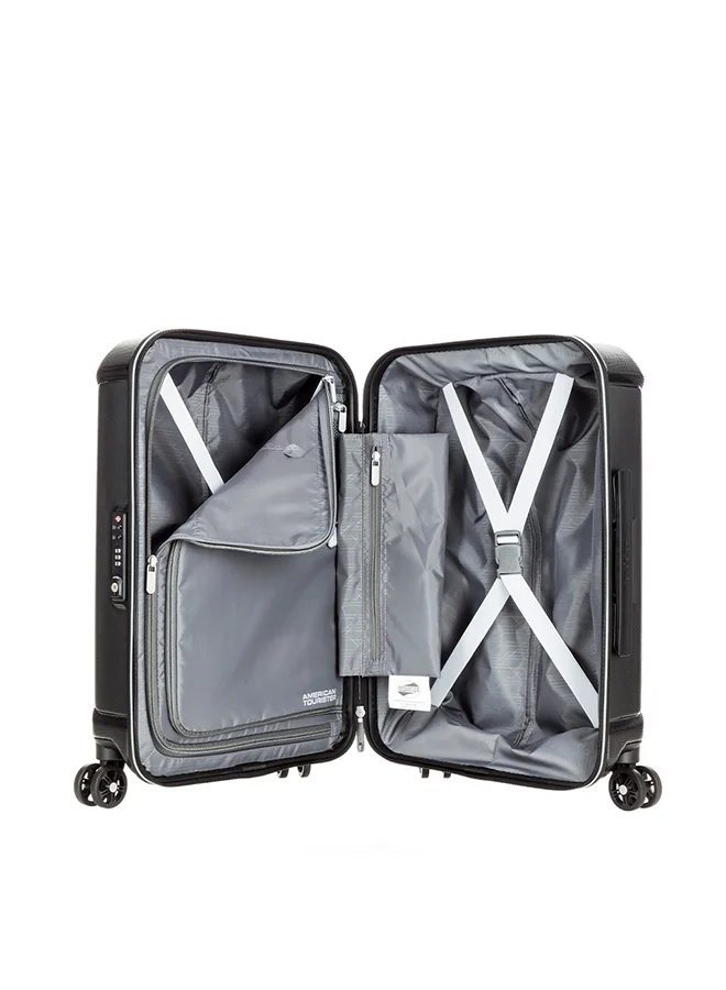 American Tourister 55 cm / 20 inch Technum Suitcase, Cabin Size 55 cm / 20 inch, 4 Spinner Wheels, Hard Top, Polycarbonate, Diamond Black|DuoSaf™ Security Zipper|Dual Tube Pull Handle|Expandable|TSA Lock - 3 Years International Warranty Diamond Black  | Best Price UAE