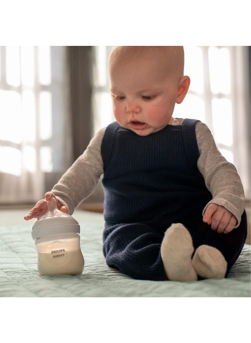 مجموعة هدايا حديثي الولادة من زجاجات الأطفال مكونة من 4 زجاجات حليب أطفال ولهاية فائقة النعومة وفرشاة زجاجة للأطفال - Image 3