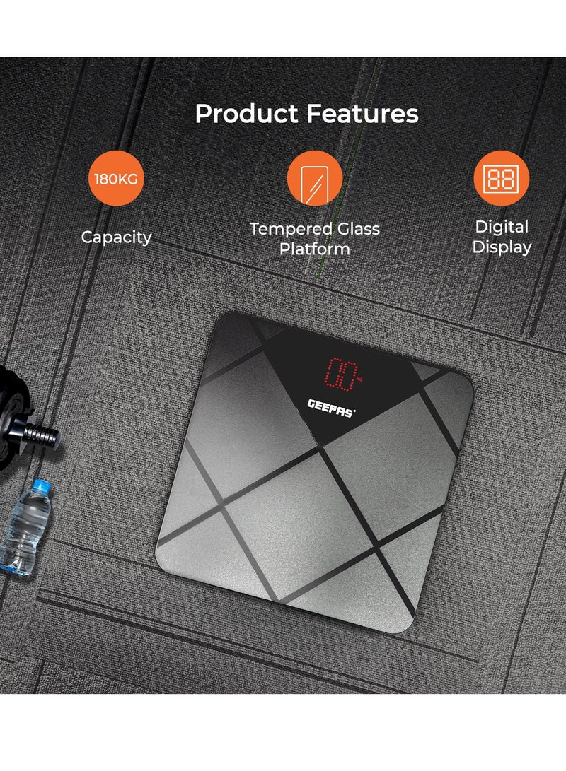 Geepas Digital Body Scale With Digital Display, Max Weight 180 Kgs, 6 MM Tempered Glass, Anti-Slip Design, Red Lattice LED, Auto On-Off, High Precision Strain Gauge Sensor GBS46523UK Grey & black
