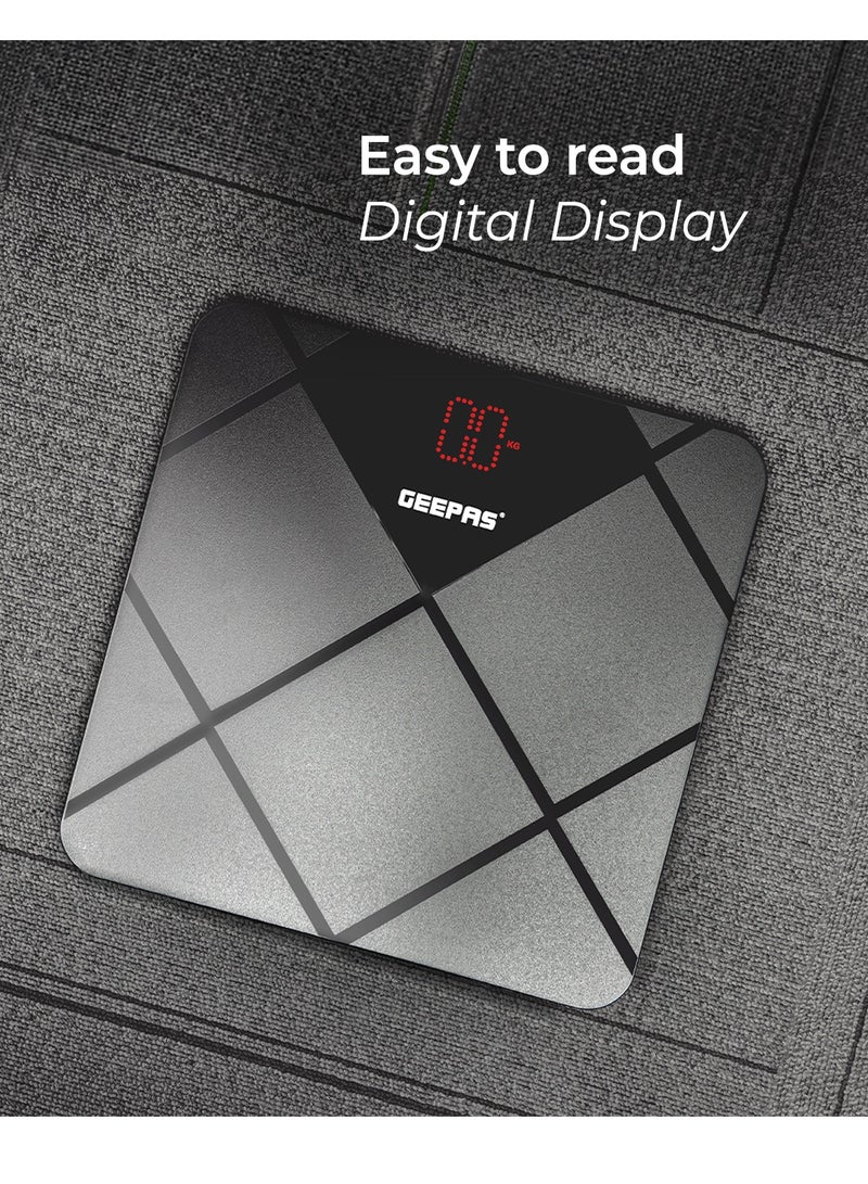 Geepas Digital Body Scale With Digital Display, Max Weight 180 Kgs, 6 MM Tempered Glass, Anti-Slip Design, Red Lattice LED, Auto On-Off, High Precision Strain Gauge Sensor GBS46523UK Grey & black