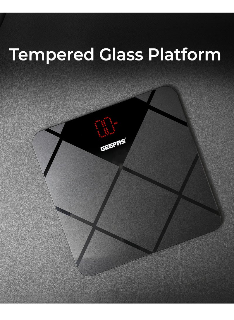 Geepas Digital Body Scale With Digital Display, Max Weight 180 Kgs, 6 MM Tempered Glass, Anti-Slip Design, Red Lattice LED, Auto On-Off, High Precision Strain Gauge Sensor GBS46523UK Grey & black