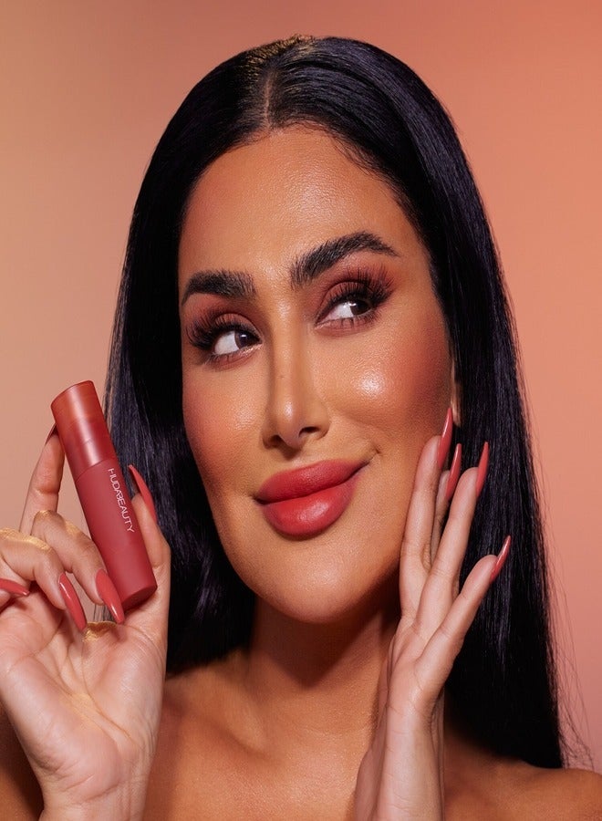 HUDA BEAUTY Cheeky Tint Cream Blush Stick Coral Cutie - A Bright Orange-Pink 5G - Image 4