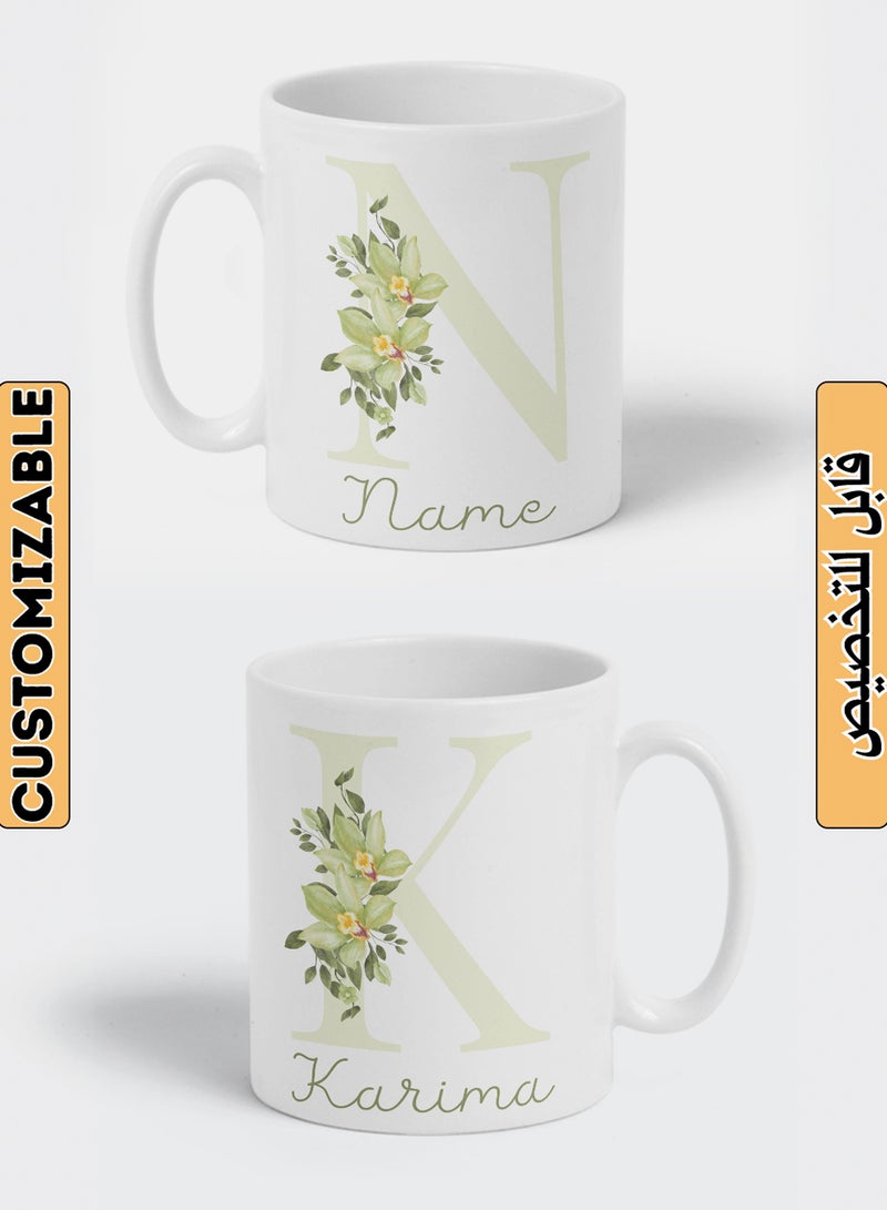 LOWHA - Customizable Ceramic 11 oz Mug with Personalized Name and Green Flowers on First Letter of The Name White - Image 1