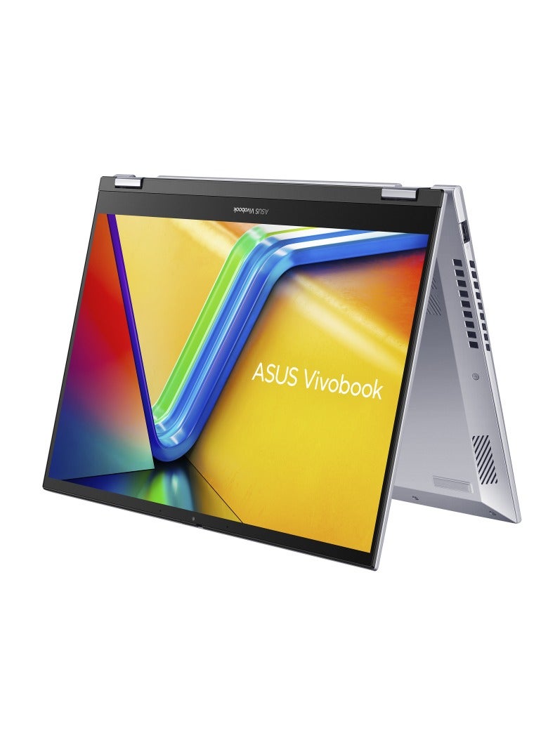 أسوس - ASUS Vivobook S14 Flip TP3402VA-EG009W Operating System	Windows 11 Home WUXGA (1920 x 1200) 14.0-inch IPS-level Panel Processor	Intel® Core™ i9-13900H Processor 2.6 GHz  On board memory	DDR4 16GB  Intergrated GPU Intel Iris Xᵉ Graphics  Storage 512GB M.2 NVMe™ PCIe® 4.0 SSD color (Cool Silver) Keyboard color (Silver) English/Arabic Cool Silver - Image 1
