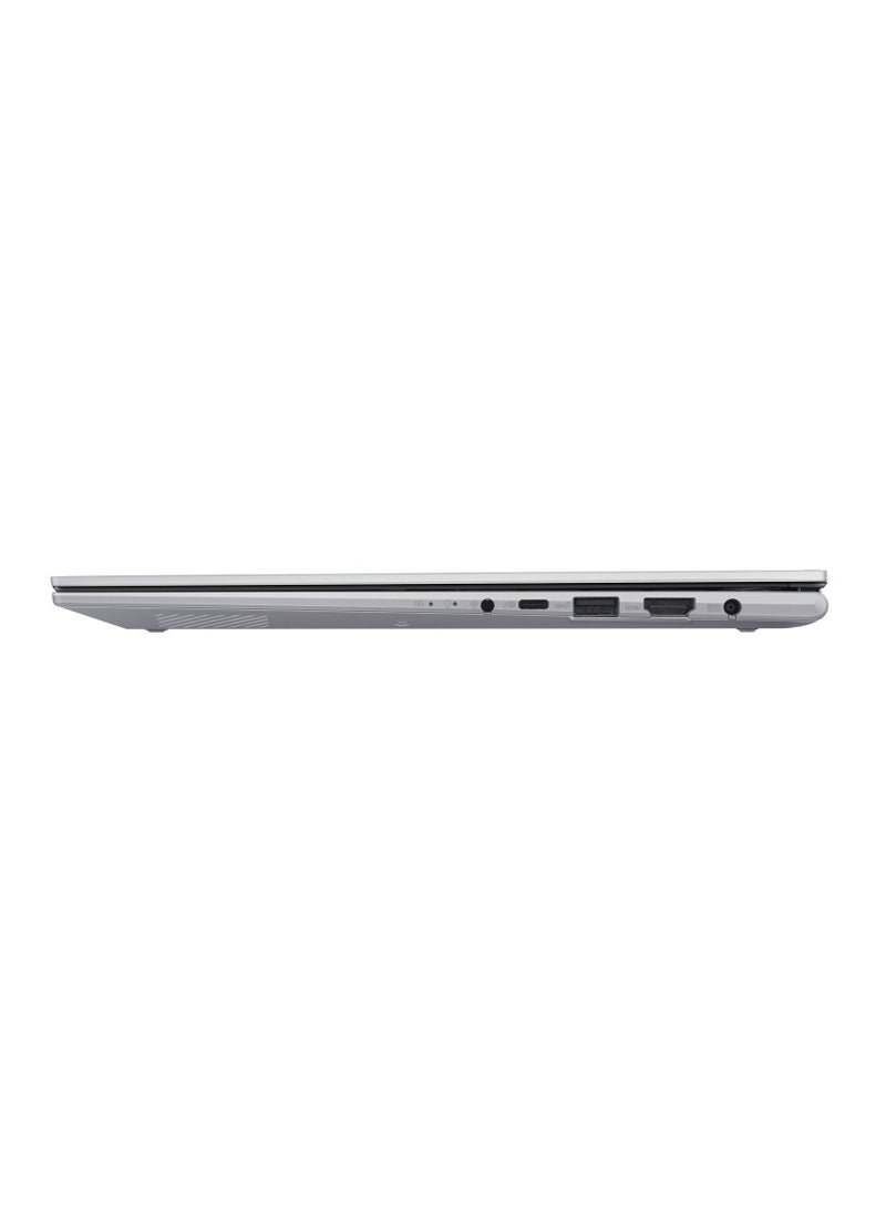 أسوس - ASUS Vivobook S14 Flip TP3402VA-EG009W Operating System	Windows 11 Home WUXGA (1920 x 1200) 14.0-inch IPS-level Panel Processor	Intel® Core™ i9-13900H Processor 2.6 GHz  On board memory	DDR4 16GB  Intergrated GPU Intel Iris Xᵉ Graphics  Storage 512GB M.2 NVMe™ PCIe® 4.0 SSD color (Cool Silver) Keyboard color (Silver) English/Arabic Cool Silver - Image 1