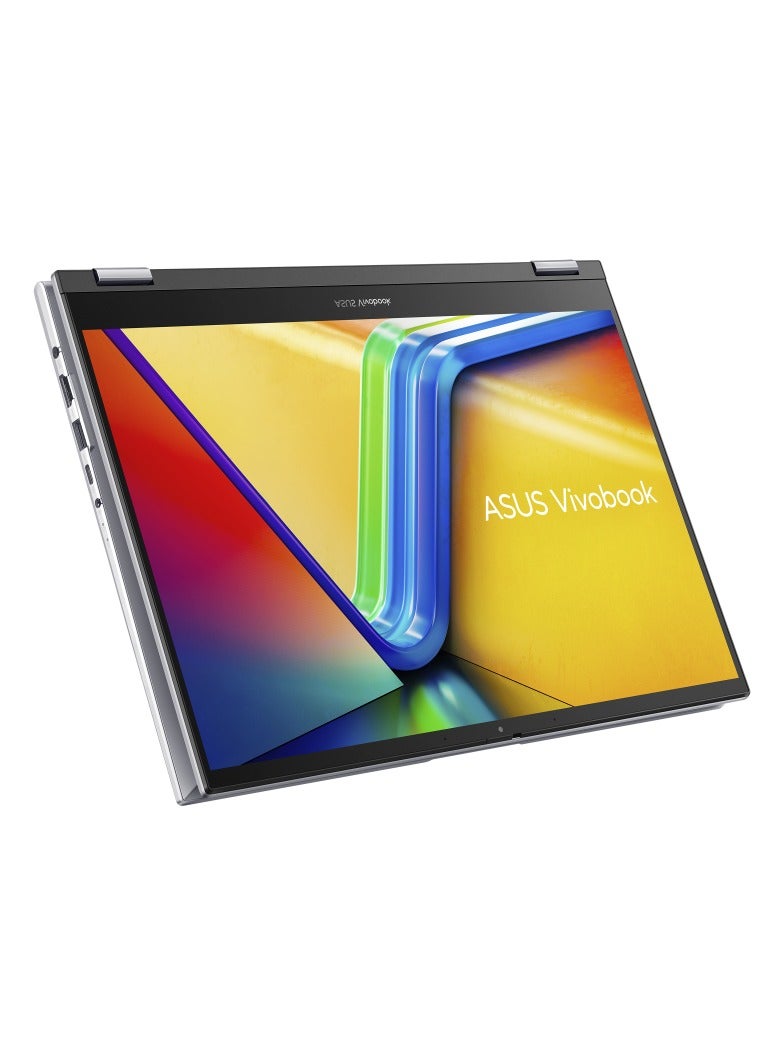 أسوس - ASUS Vivobook S14 Flip TP3402VA-EG009W Operating System	Windows 11 Home WUXGA (1920 x 1200) 14.0-inch IPS-level Panel Processor	Intel® Core™ i9-13900H Processor 2.6 GHz  On board memory	DDR4 16GB  Intergrated GPU Intel Iris Xᵉ Graphics  Storage 512GB M.2 NVMe™ PCIe® 4.0 SSD color (Cool Silver) Keyboard color (Silver) English/Arabic Cool Silver - Image 1