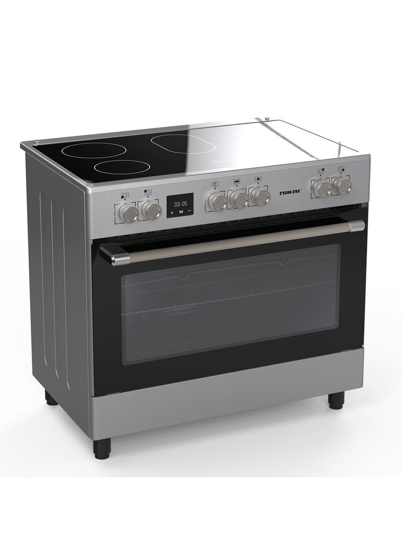 نيكاي موقد كهربائي 90x60 سم مع سطح زجاجي سيراميكي، 5 شعلات، فرن كبير، فولاذ مقاوم للصدأ، طهي متعدد الوظائف، مؤقت رقمي - Image 1