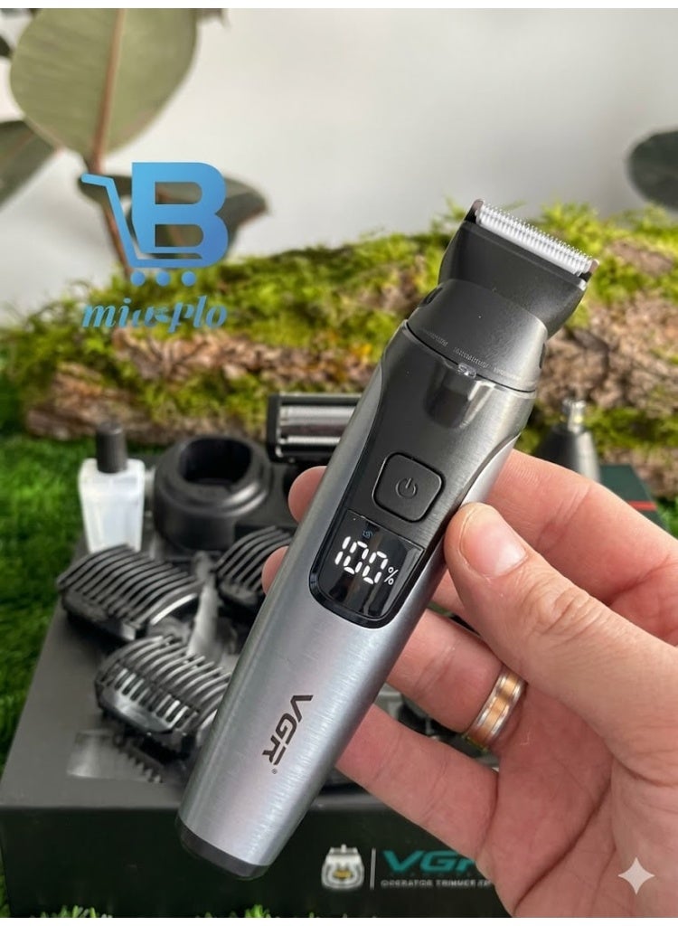 في جي آر The VGR V-634 is a high-performance Professional 4-in-1 Grooming Kit. It is specifically marketed for its IPX7 Waterproof rating (shower-safe) and a unique built-in LED spotlight on the trimmer head to help with visibility in sensitive or low-light areas. Chrome Silver & Obsidian - Image 1