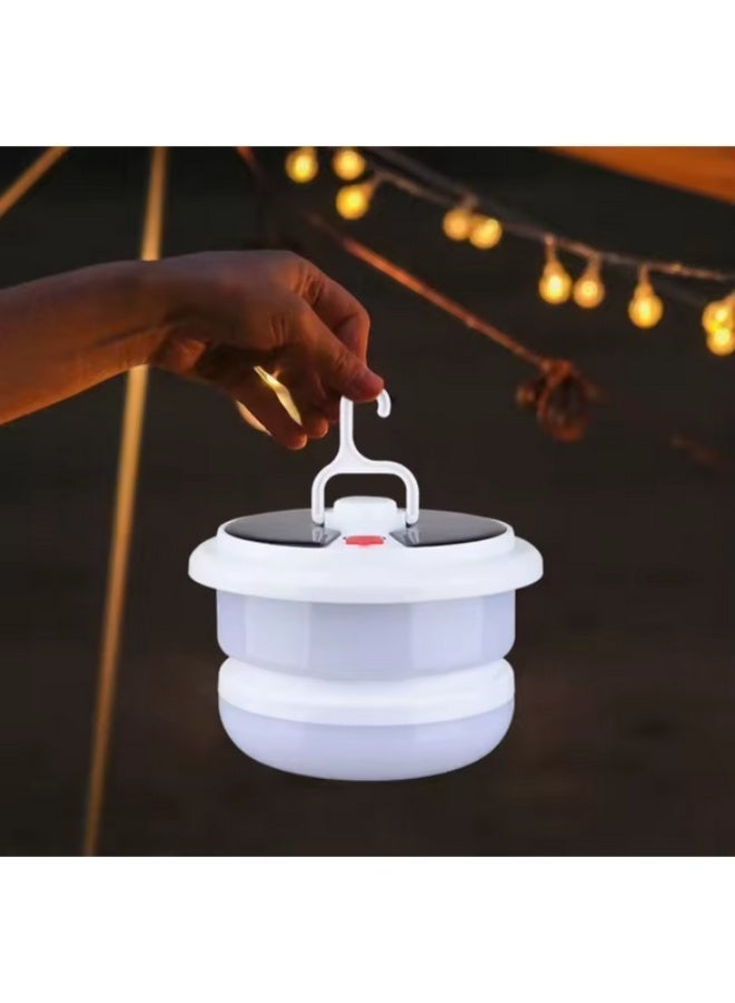 A multi-mode lamp with integrated RGB colored light strings that can be folded and concealed inside the lamp. - Image 1