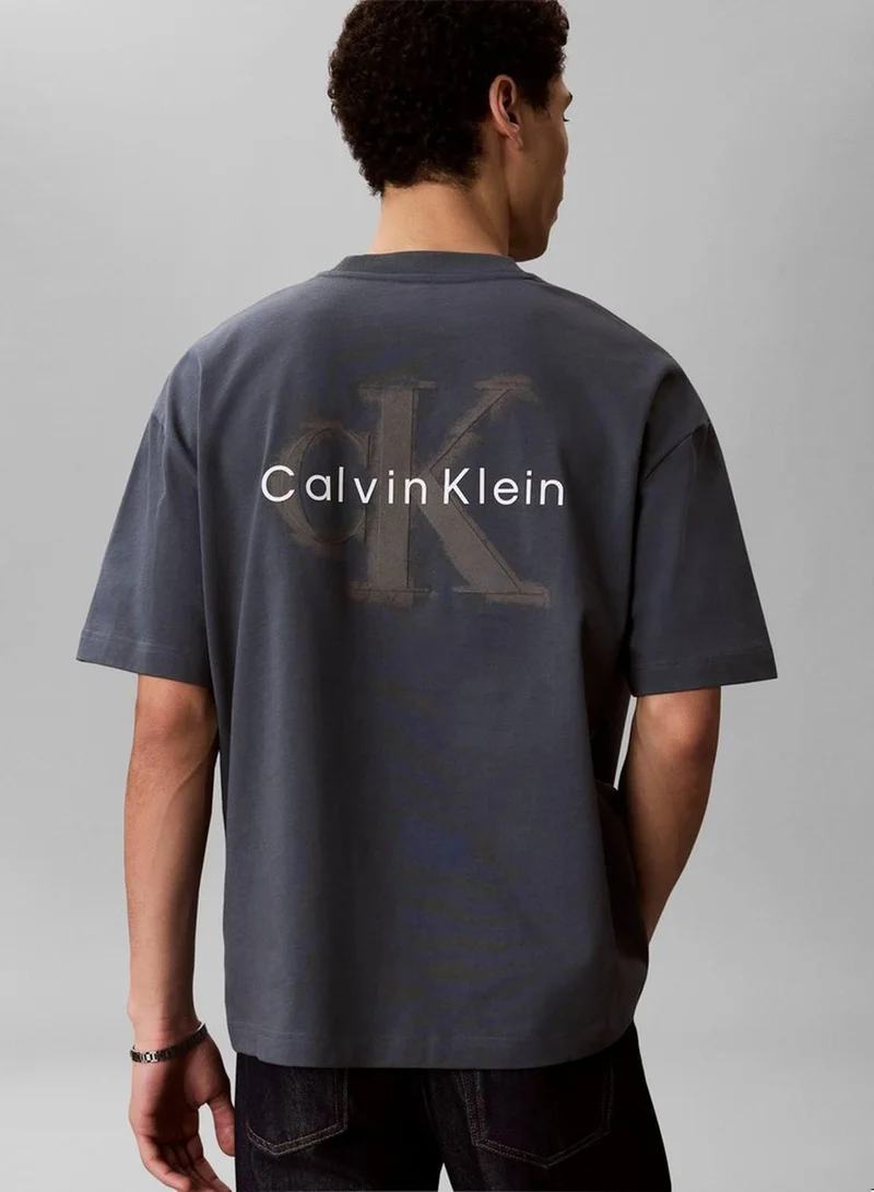 Calvin Klein Jeans Dark Slate Oversized Embossed Logo T-Shirt for Men | Best Price UAE