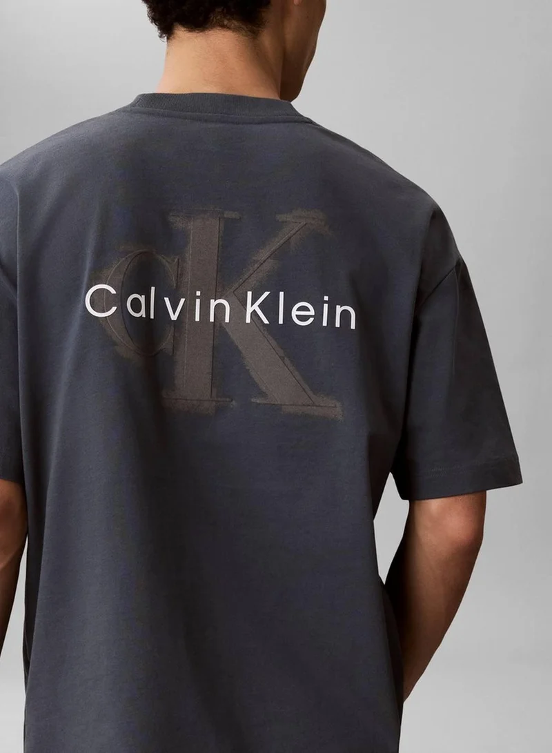 Calvin Klein Jeans Dark Slate Oversized Embossed Logo T-Shirt for Men | Best Price UAE