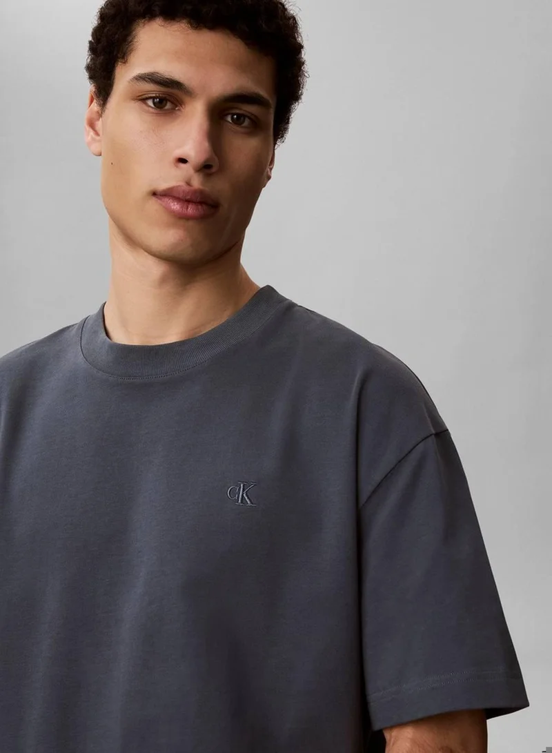 Calvin Klein Jeans Dark Slate Oversized Embossed Logo T-Shirt for Men | Best Price UAE