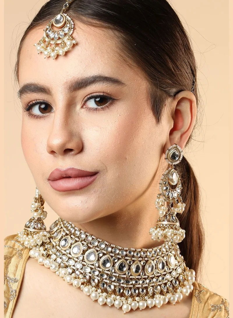 SOHI Gold Plated Designer Kundan Party Necklace, Earring and Maang Tikka Set For Women