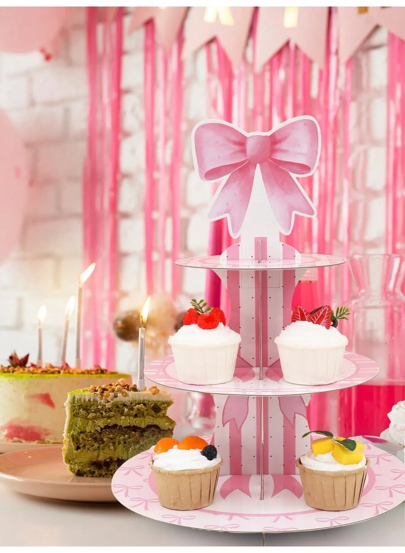 صحن حامل كب كيك مكون من ثلاث طبقات بتصميم فيونكه ورديه  يضيف لمسة جمالية لأي مناسبة مصنوع من كرتون قوي يوفر ثباتاً ممتازاً عند الاستخدام مناسب لتوزيعات حفلات اعياد الميلاد ، استقبال المولود الجديد و جميع المناسبات الخاصه - Image 4