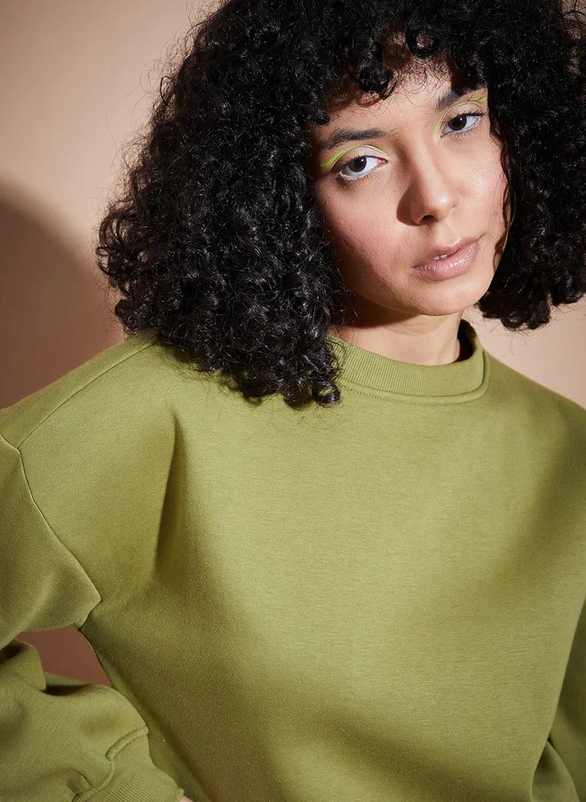 ساسافراس بلوزة نسائية فضفاضة بلون أخضر زيتوني