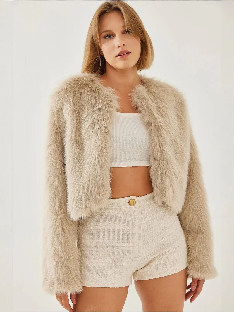 بيانكو لوتشي معطف فرو صناعي قصير من لوكسي