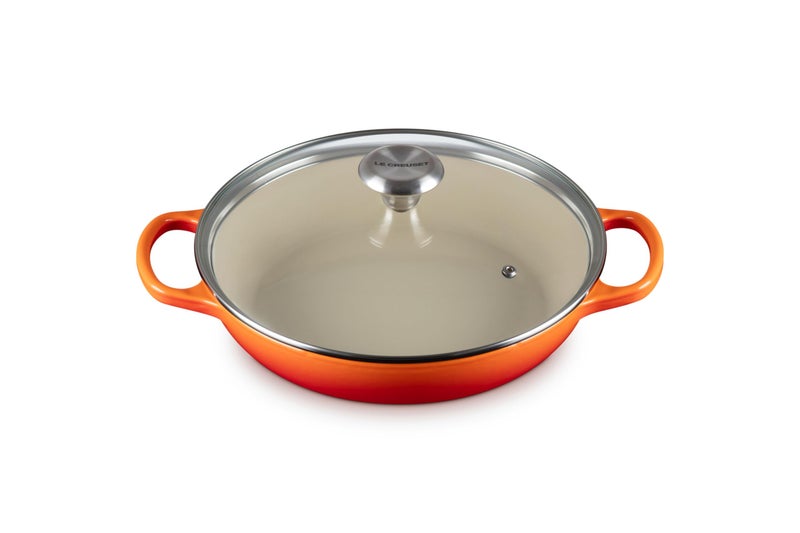 Le Creuset طباخ دائري مزجج من الحديد الزهر من لو كروزيه مع غطاء زجاجي سعة 225 كيو تي باللون اللهب