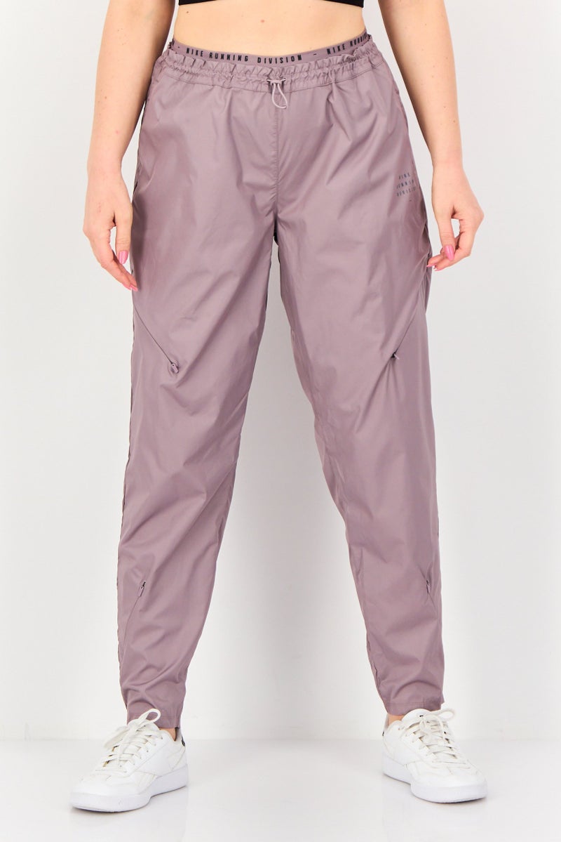 Nike Women Standard Fit Running Track Pants, Mauve - Image 1