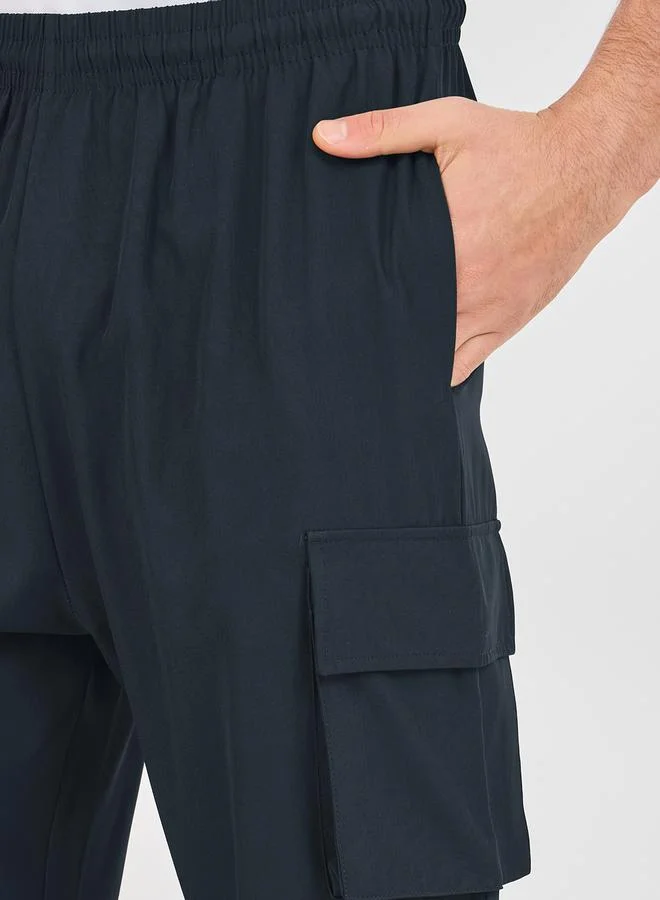Styli Cargo Pocket Oversized Woven Athleisure Pants with Badge