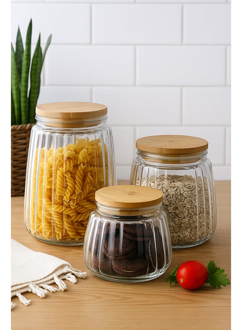 ليفينج طقم برطمان زجاجي للشاي و السكر و القهوة محكم الغلق بغطاء خشبي ، 3 قطع - Image 1