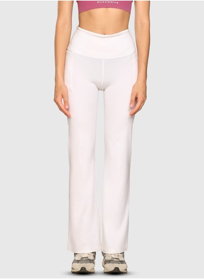 Musclemind Women's Flare Pants with High Waist Anti Slip No Roll Down Waistband, 2 Deep Pockets, Super Soft, Lightweight And Streachable Fabric for All Day Comfort  - Image 1