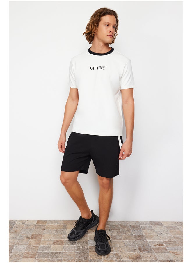 trendyol Ecru-Black Regular/Normal Cut Embossed Text Print T-Shirt-Shorts Tracksuit Set TMNSS24EM00006  - Image 1