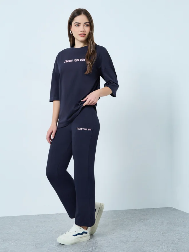 Styli Styli Navy Blue Printed T-Shirt and Flared Leggings Co-Ords