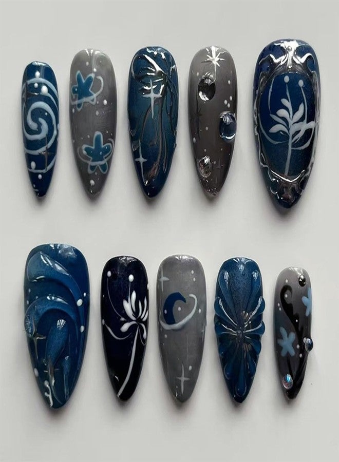 HJKDSFD Dark Blue Press on Nails Medium Almond Fake Nails Cute Glossy False Nails 3D Embossed Acrylic Nails with Starry Sky Flower Designs Full Cover Glue on Nail for Women Girls 24PCS - Image 1