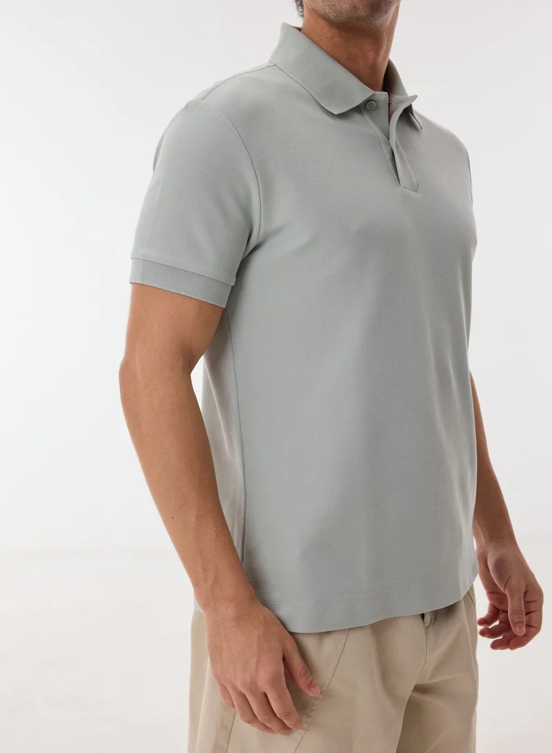 أشيتا فرنانديز Caveil Men’s Light Blue Cotton Blend Polo Shirt – Relaxed Fit, Solid, Lightweight Casual Wear