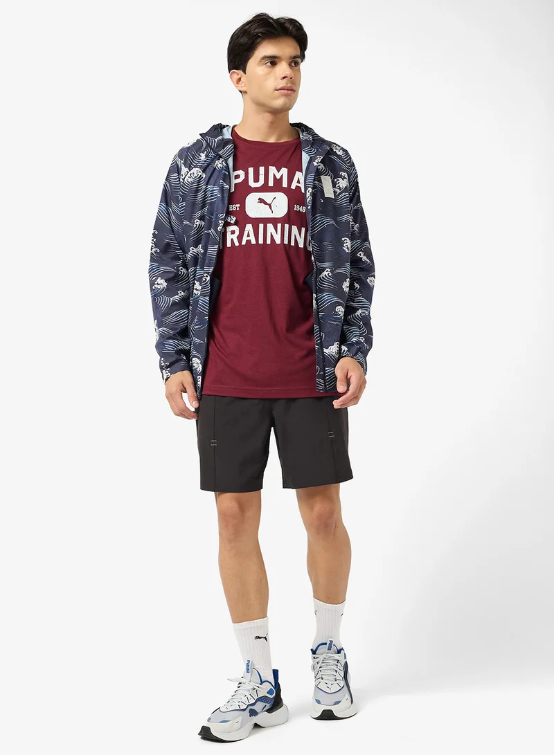 PUMA Graphics Logo Relaxed T-Shirt