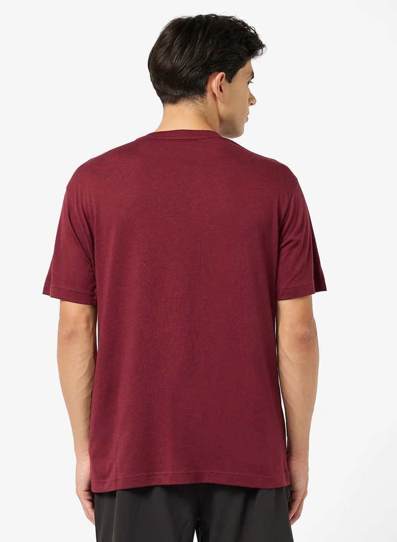 PUMA Graphics Logo Relaxed T-Shirt