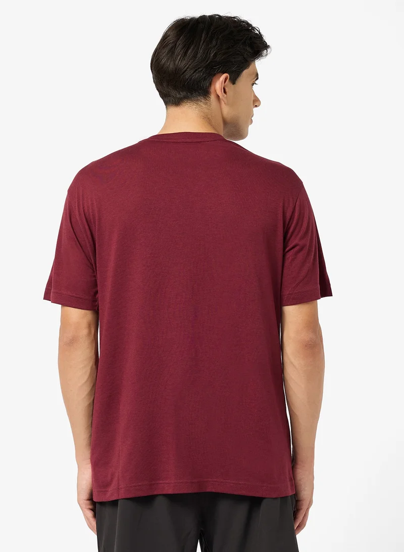 PUMA Graphics Logo Relaxed T-Shirt