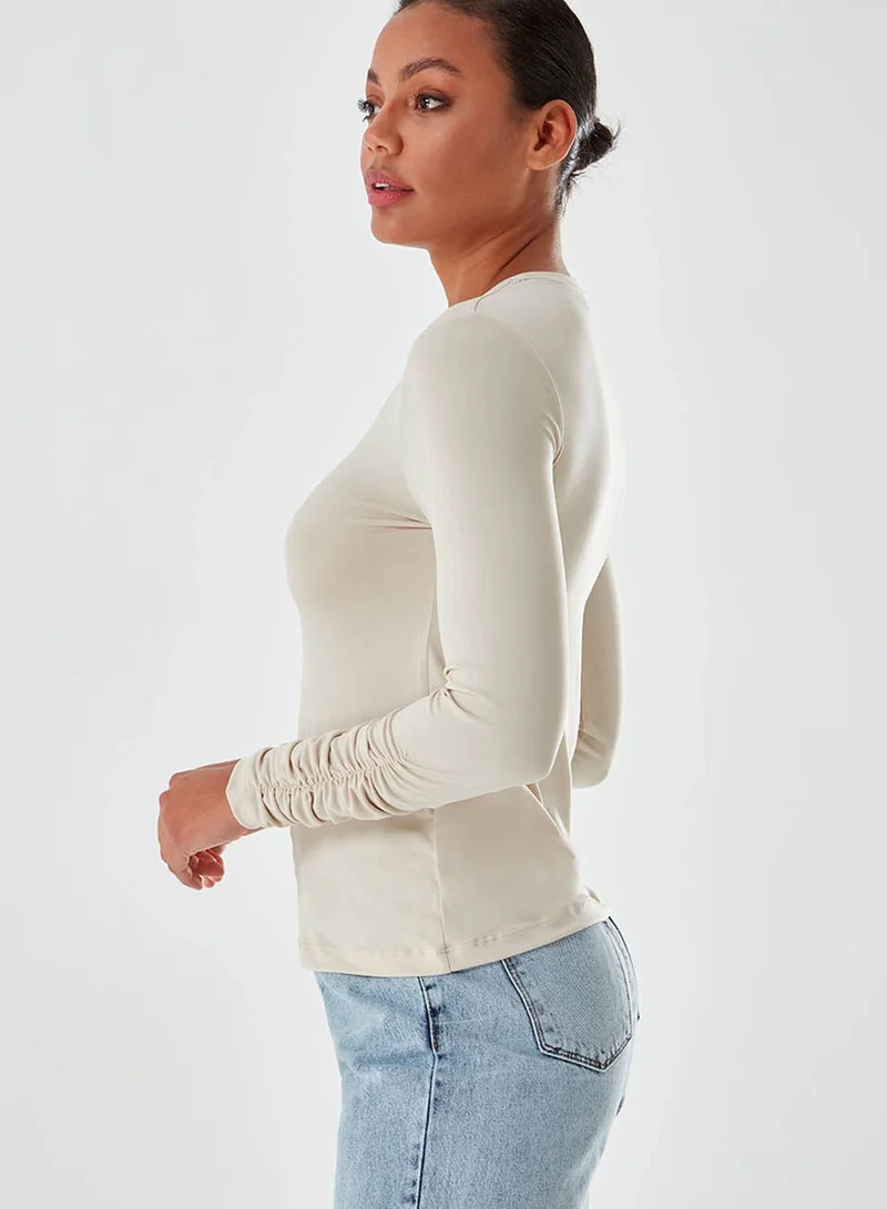 ميزال بلوزة بأكمام طويلة