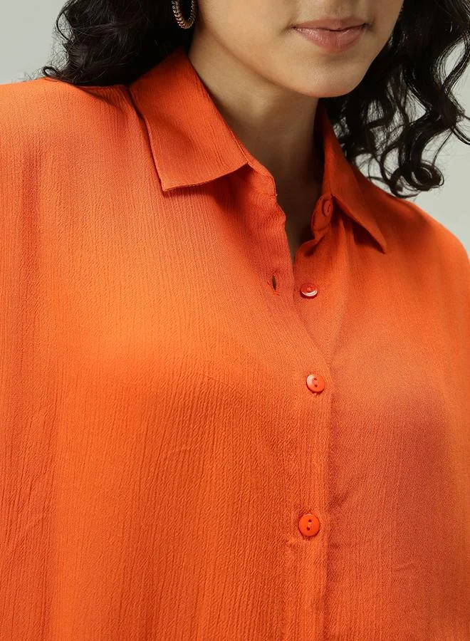 Outzidr  Orange Solid Flowy Shirt for Women | Best Price UAE