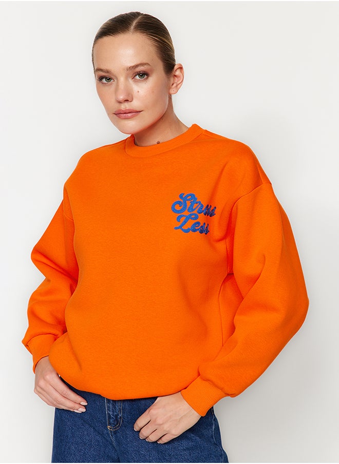trendyol Orange Thick Inside Polar Slogan Embroidered Regular/Normal Pattern Knitted Sweatshirt TWOAW24SW00094  - Image 1